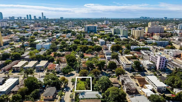 an aerial view of a city with lots of residential buildings