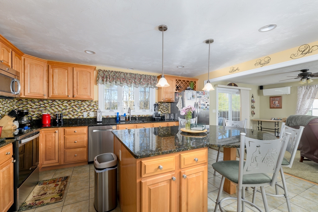 34 Marjorie Lane Rutland, MA 01543 - Photo 3 of 33 a kitchen filled with stainless steel appliances granite countertop a sink and cabinets