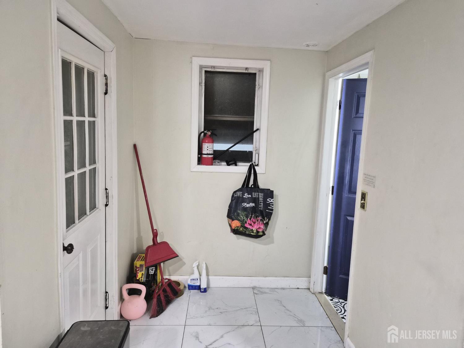 95 Farragut Road North Plainfield, NJ 07060 - Photo 8 of 30 a view of storage and utility room with a window