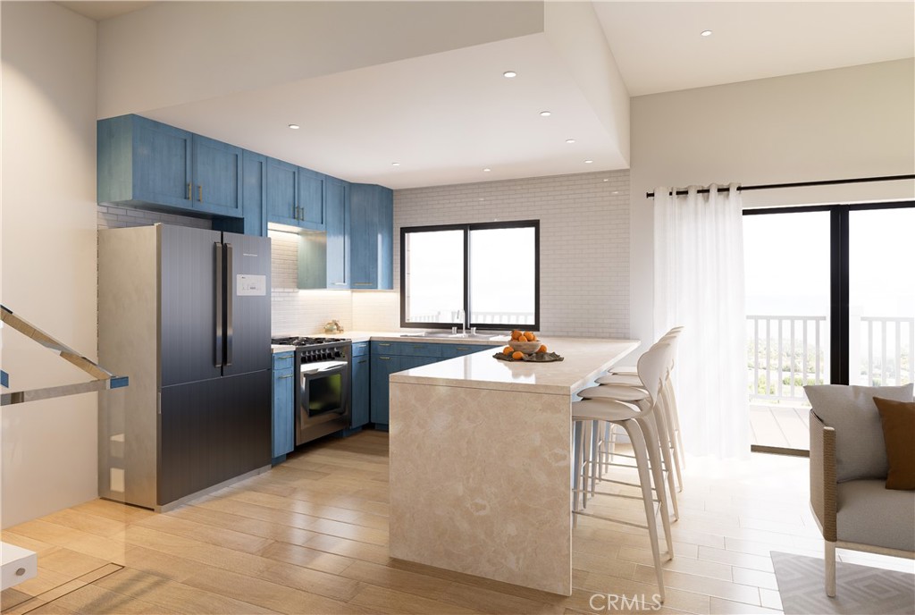 31302 Andres Pico Road San Juan Capistrano, CA 92675 - Photo 2 of 23 a kitchen with stainless steel appliances granite countertop a refrigerator a stove a sink dishwasher and a refrigerator