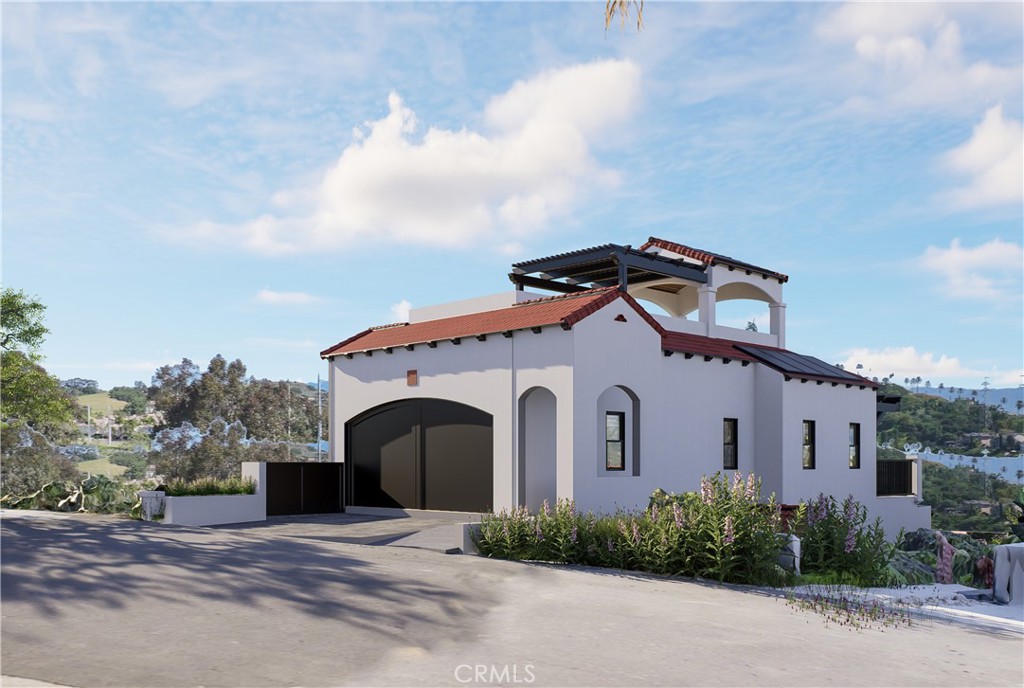 31302 Andres Pico Road San Juan Capistrano, CA 92675 - Photo 33 of 33 a white building with a clock on the side of it