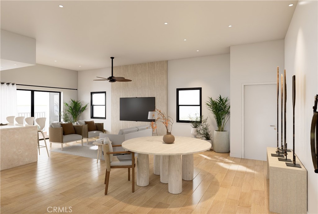 31302 Andres Pico Road San Juan Capistrano, CA 92675 - Photo 9 of 23 a view of a dining room with furniture window and wooden floor
