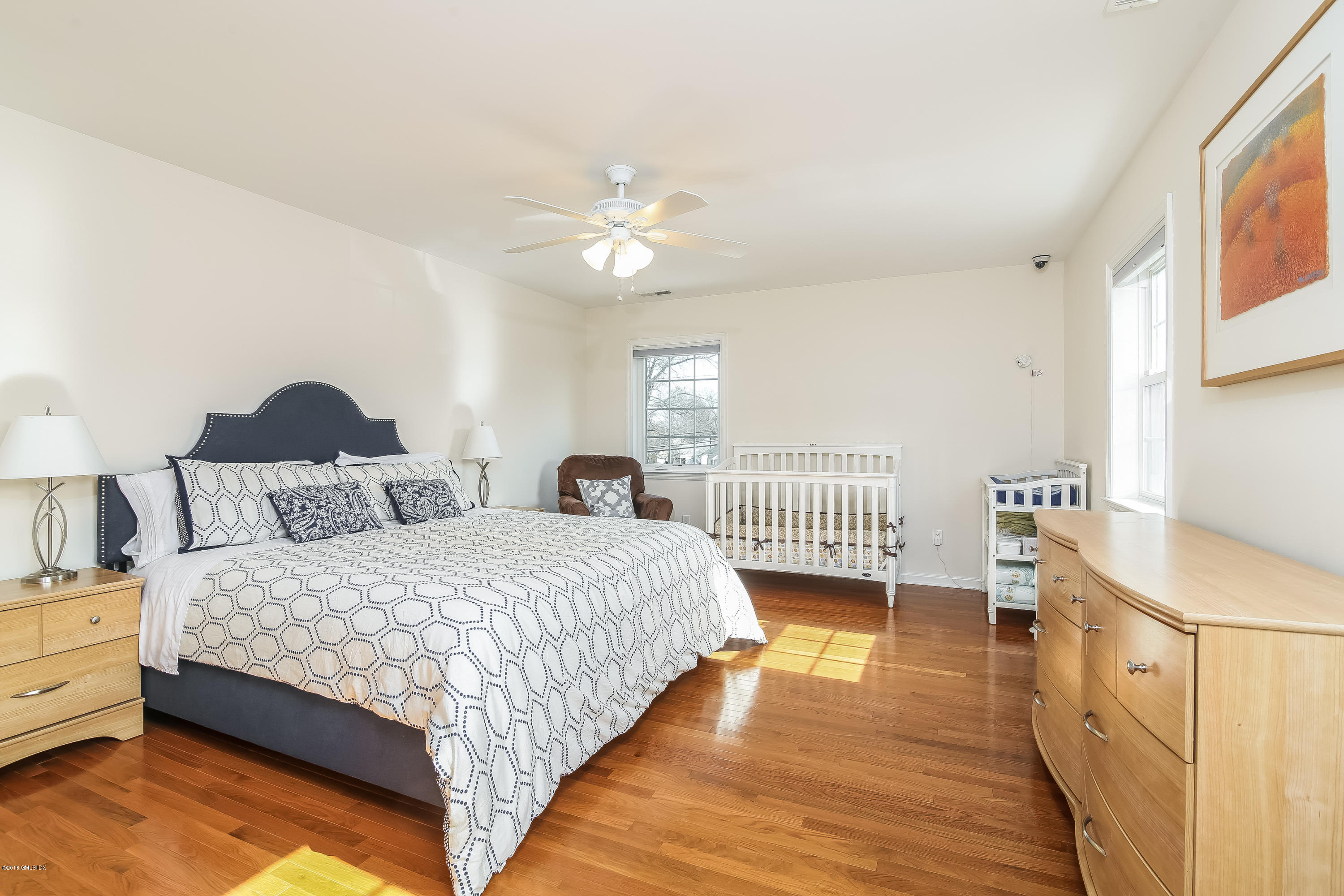 68 Sheep Hill Road Riverside, CT 06878 - Photo 24 of 38 a bedroom with double bed and a window
