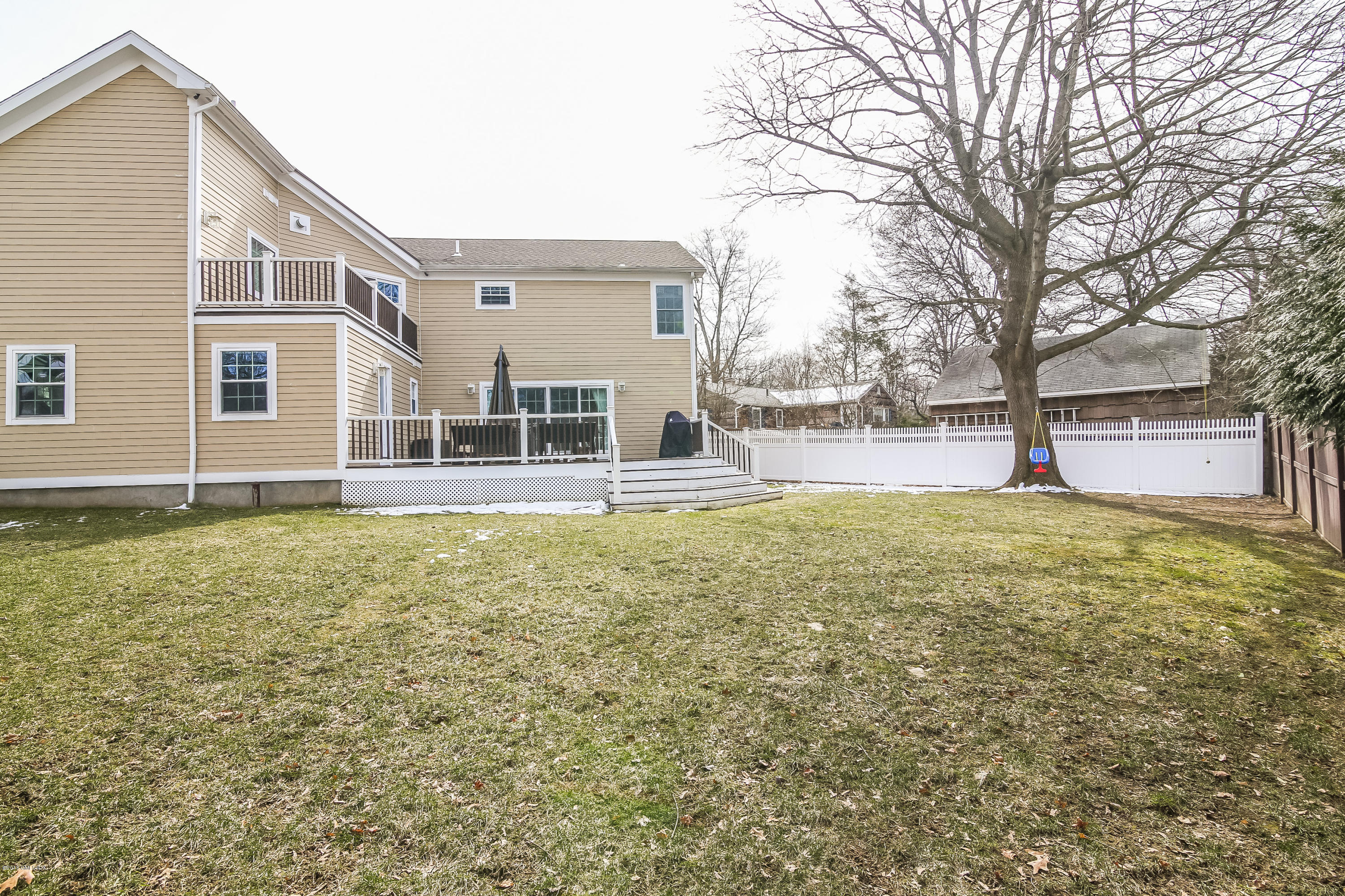 68 Sheep Hill Road Riverside, CT 06878 - Photo 35 of 38 a house with trees in front of it