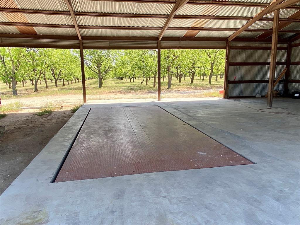 751 County Road 424 Comanche, TX 76442 - Photo 16 of 26 a view of room with a window and a fireplace