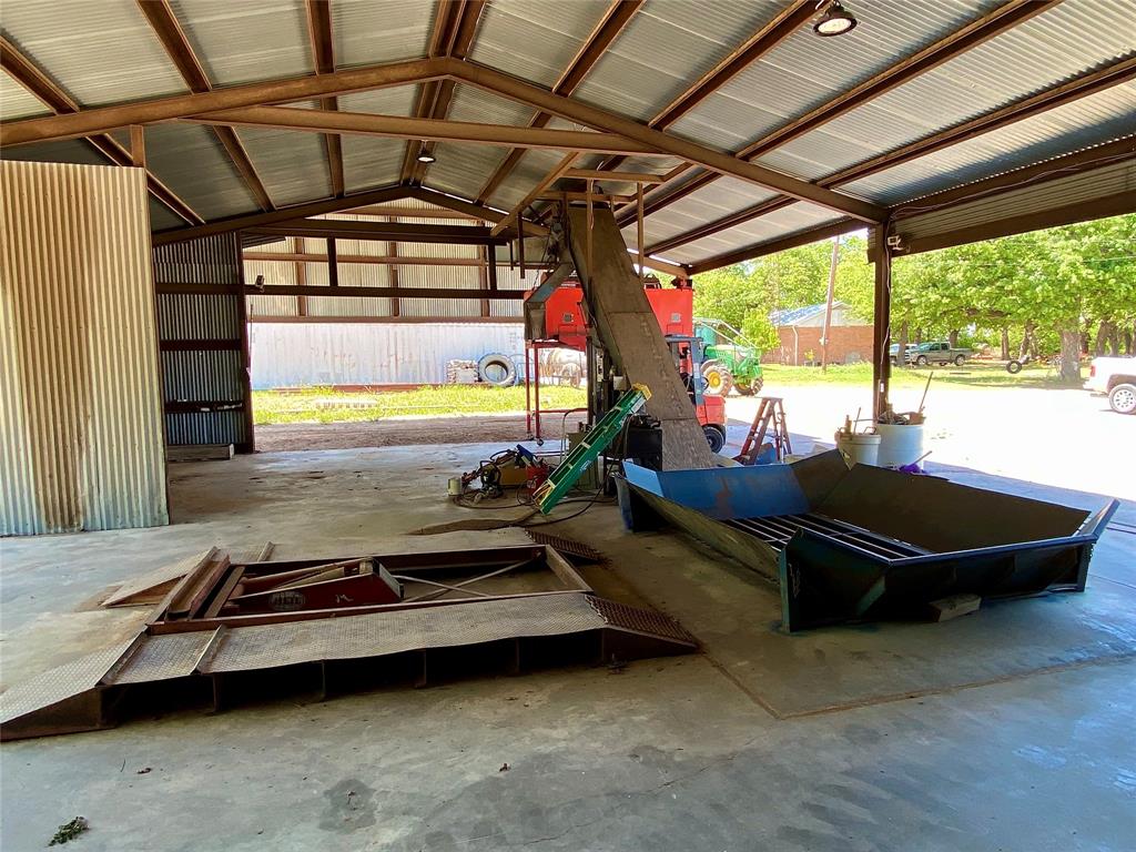 751 County Road 424 Comanche, TX 76442 - Photo 17 of 26 a living room with furniture a flat screen tv and a table