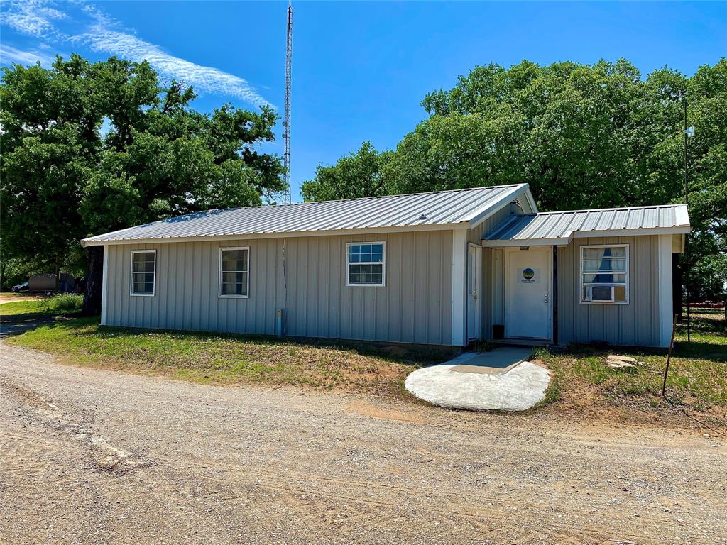 751 County Road 424 Comanche, TX 76442 - Photo 9 of 26 a view of a house with a yard