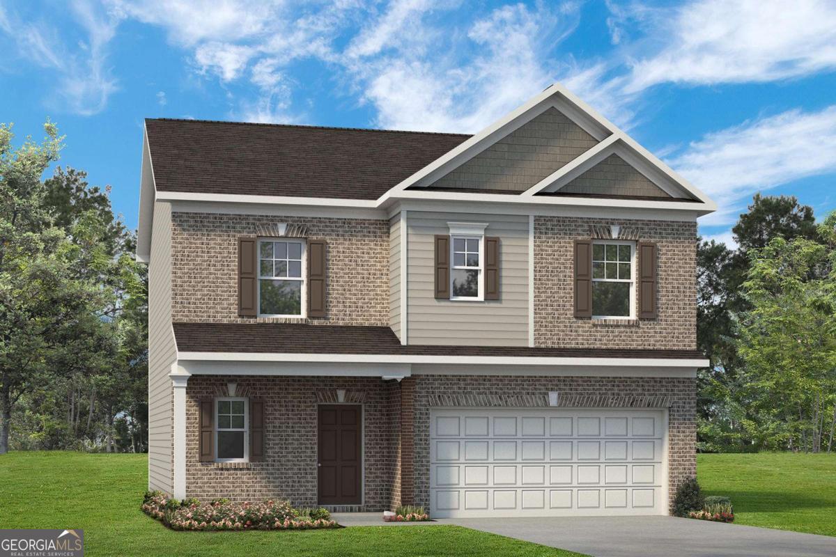 10413 Trellis Lane, Unit (LOT 33) Hampton, GA 30228 - Photo 2 of 39 a front view of a house with garden