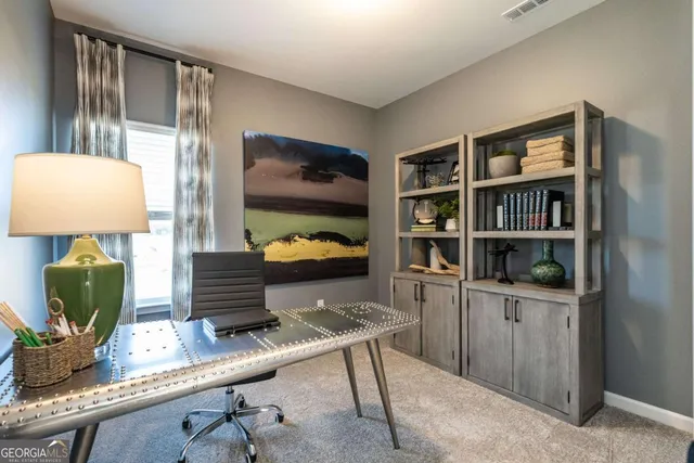 a room with furniture and a book shelf