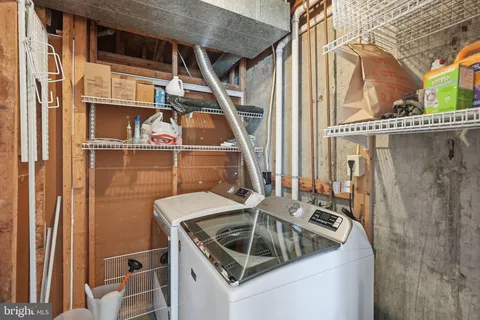 a kitchen that has a sink and a window