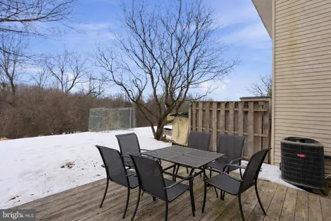 a view of a table and chairs in patio
