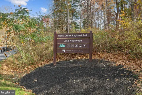 a view of a tree in front of a house