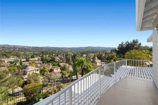 a view of a city from a balcony