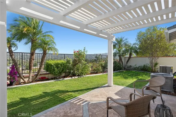 a view of yard with patio