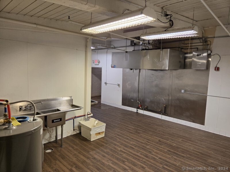 a empty room with wooden floor