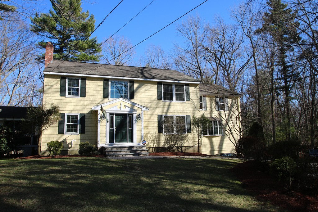 165 Herrick Road Boxford, MA 01921 - Photo 1 of 30 a front view of a house with a garden