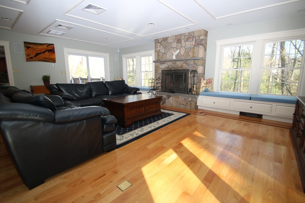 165 Herrick Road Boxford, MA 01921 - Photo 13 of 30 a living room with furniture and a fireplace