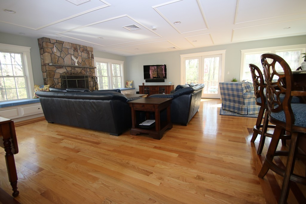 165 Herrick Road Boxford, MA 01921 - Photo 14 of 30 a living room with furniture and a flat screen tv