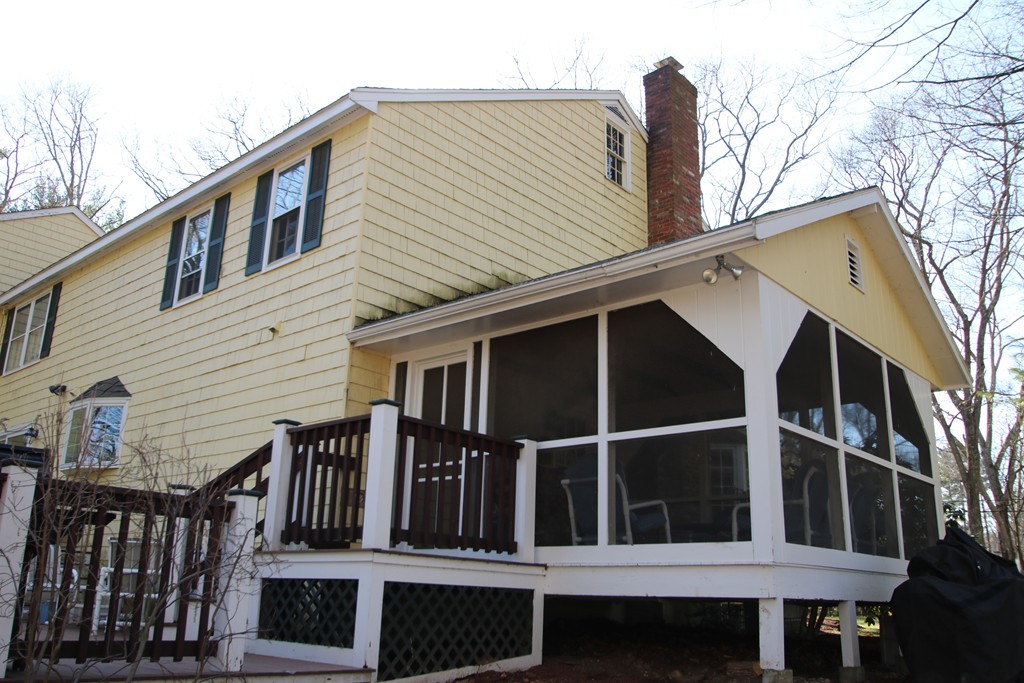165 Herrick Road Boxford, MA 01921 - Photo 29 of 30 a view of wooden house with large windows