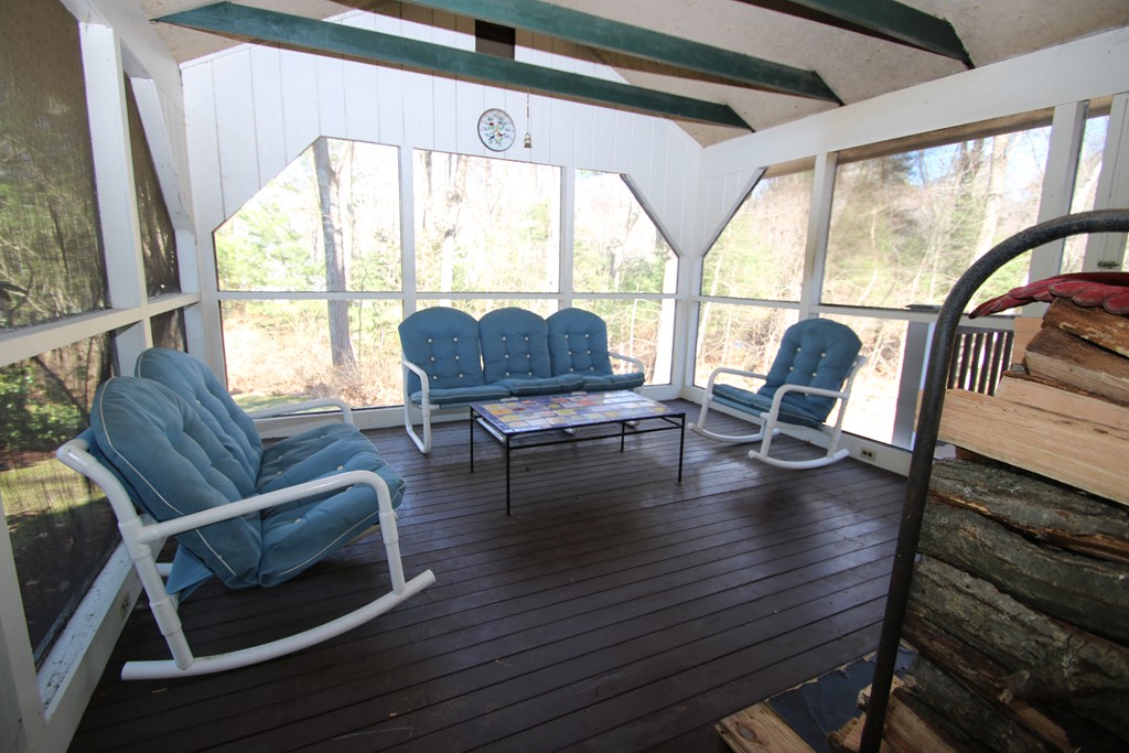 165 Herrick Road Boxford, MA 01921 - Photo 30 of 30 a living room with furniture and floor to ceiling windows