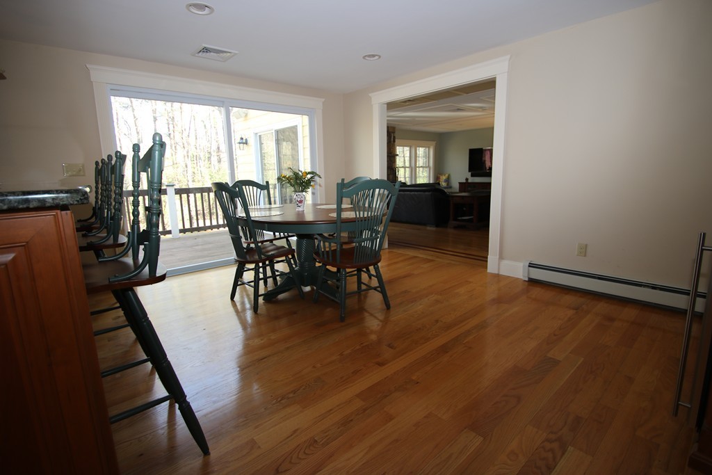 165 Herrick Road Boxford, MA 01921 - Photo 6 of 30 a view of a dining room with furniture window and wooden floor