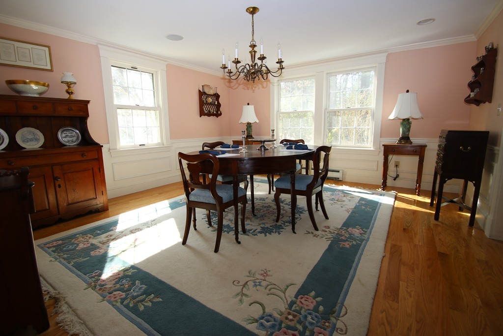 165 Herrick Road Boxford, MA 01921 - Photo 8 of 30 a view of a dining room with furniture window and wooden floor
