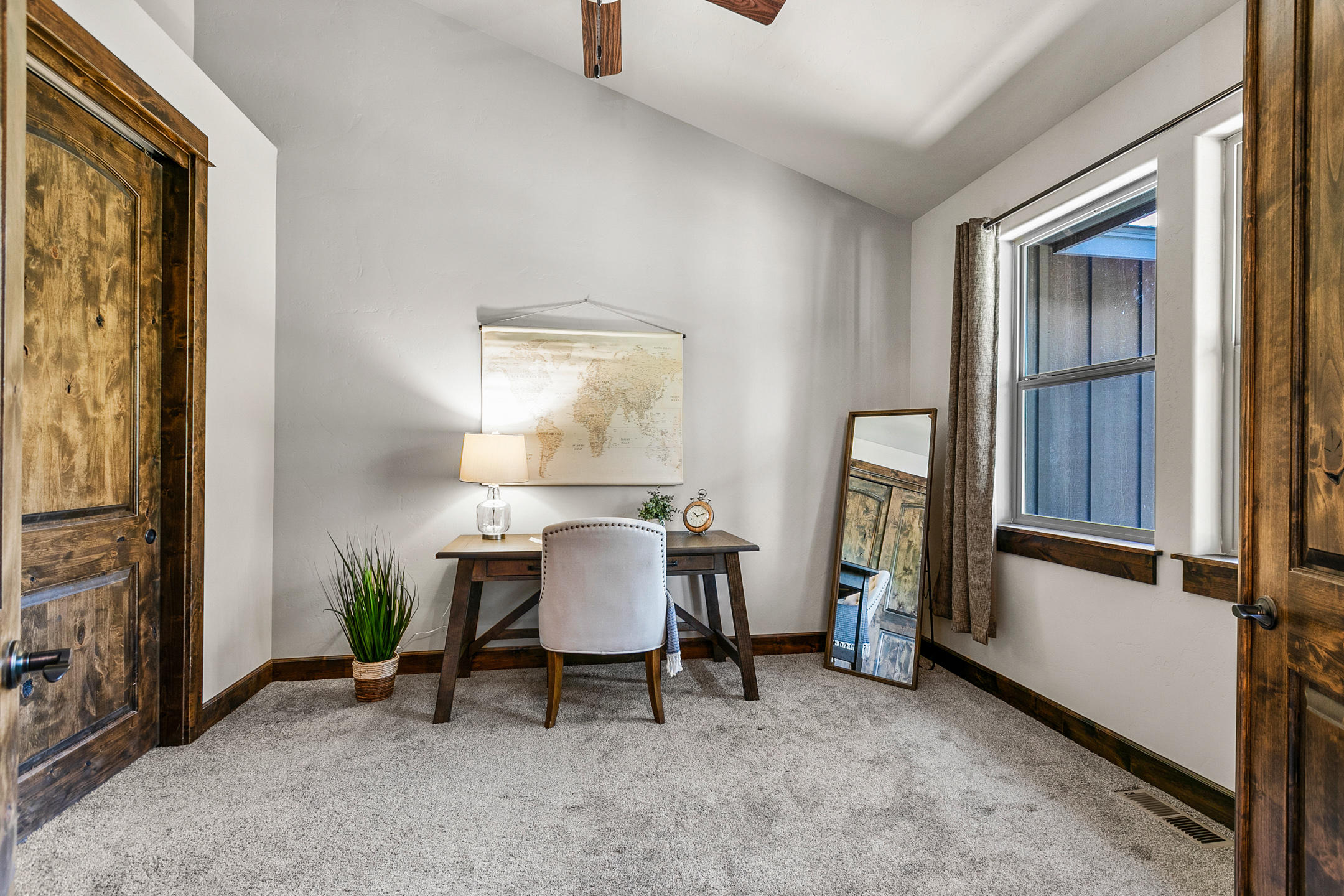 17067 Glendale Road Bend, OR 97707 - Photo 11 of 29 a view of a workspace with furniture and a window