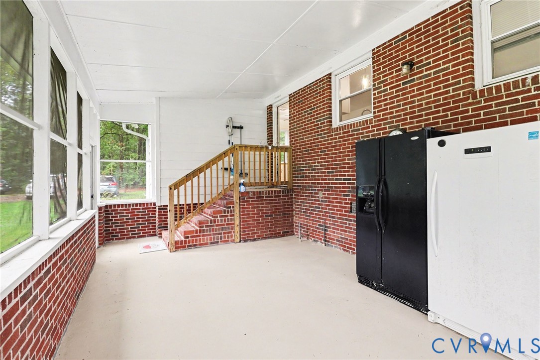 6921 Hines Road Disputanta, VA 23842 - Photo 25 of 35 Enclosed screened porch.