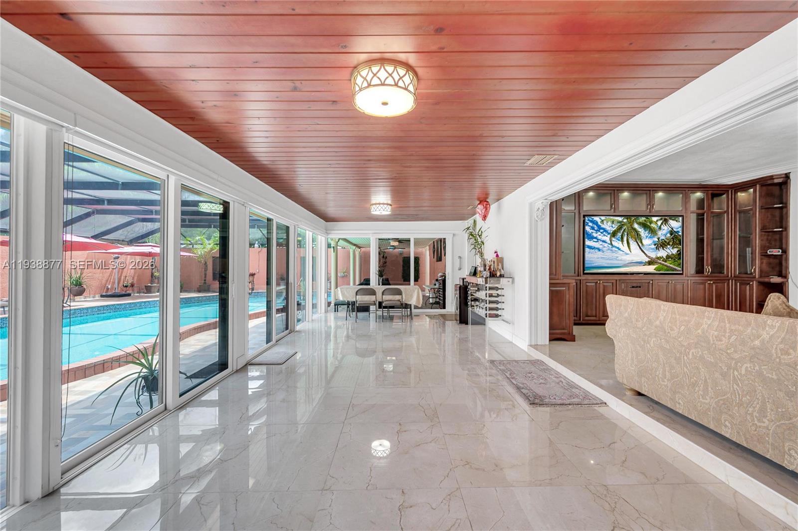 110 Shore Drive West Miami, FL 33133 - Photo 11 of 40 a view of an entryway with dining area