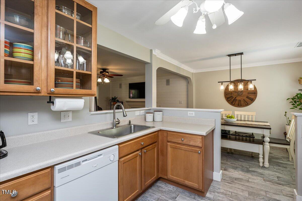 4204 Derry Court Raleigh, NC 27616 - Photo 11 of 30 a kitchen with a sink and a stove