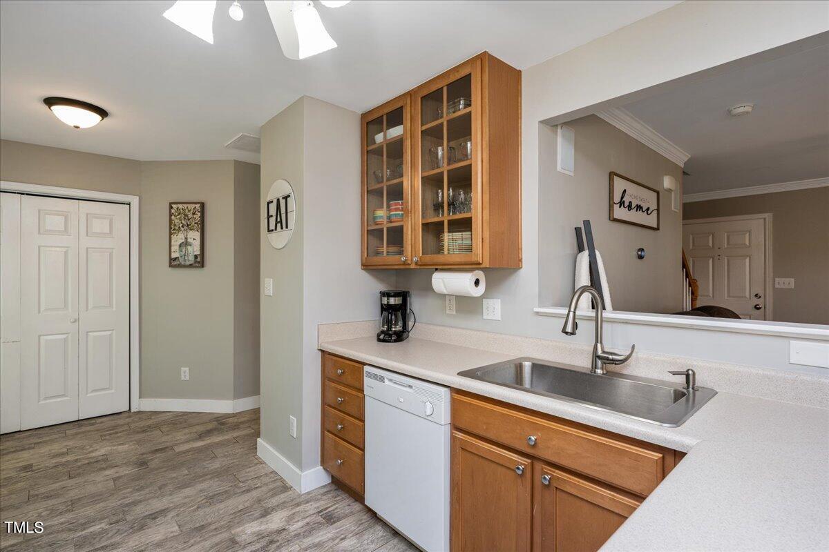 4204 Derry Court Raleigh, NC 27616 - Photo 13 of 30 a kitchen with a sink and cabinets