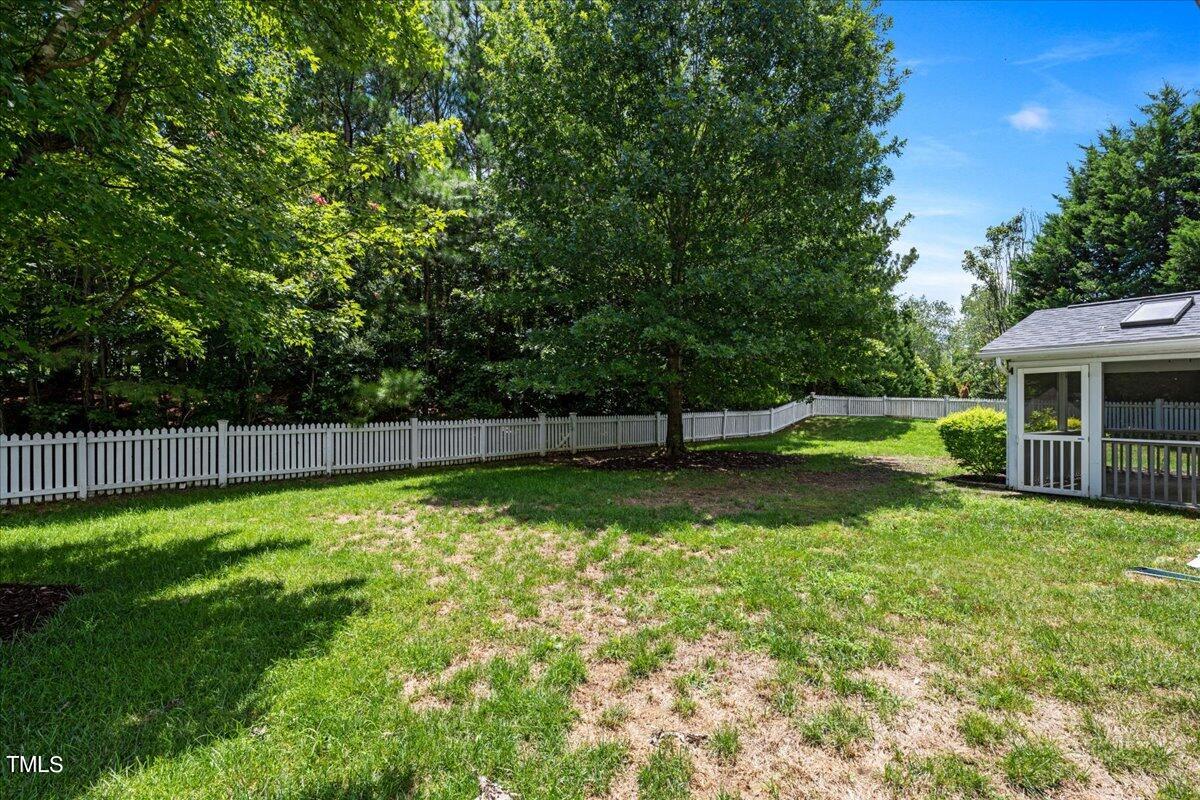 4204 Derry Court Raleigh, NC 27616 - Photo 25 of 30 a view of a backyard with a small cabin