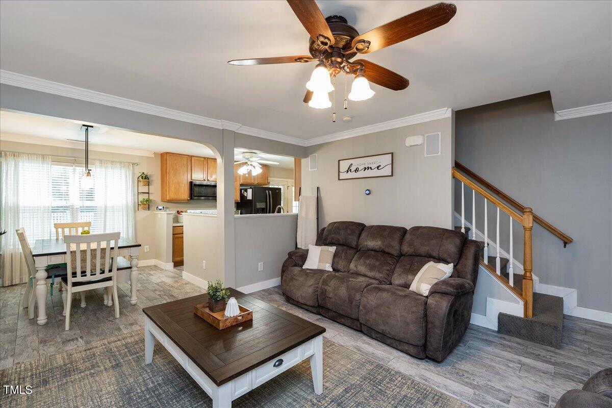 4204 Derry Court Raleigh, NC 27616 - Photo 5 of 30 a living room with furniture and a view of kitchen