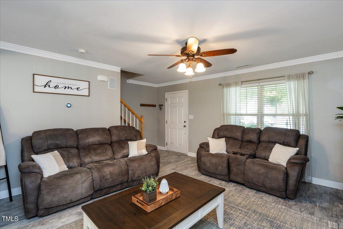 4204 Derry Court Raleigh, NC 27616 - Photo 6 of 30 a living room with furniture rug and window