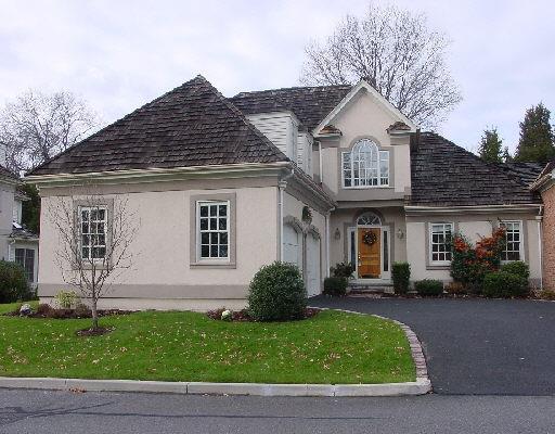 174 Stillson Road, Unit 174 Fairfield, CT 06825 - Photo 1 of 1 a front view of a house with a yard