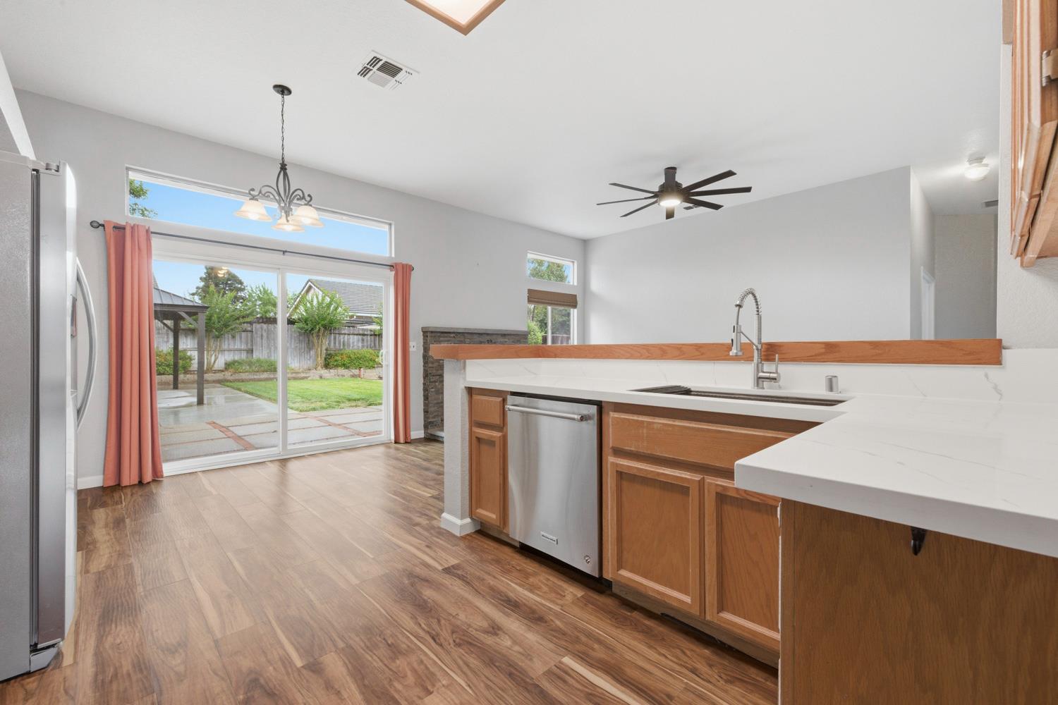 969 Colson Way Galt, CA 95632 - Photo 11 of 38 a kitchen with a sink and a large window