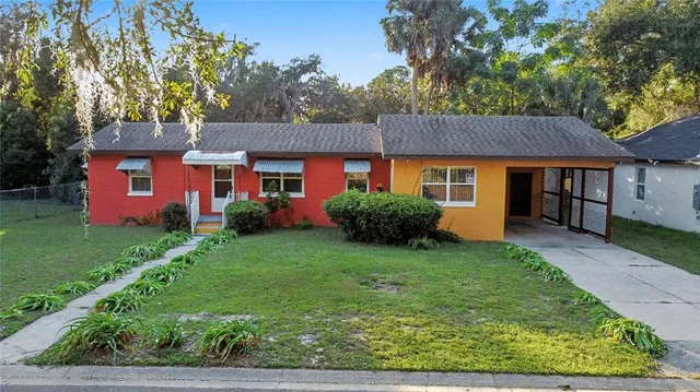 a view of a house with a garden