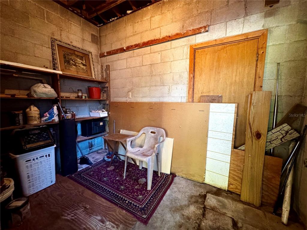 612 Kensington Street Eustis, FL 32726 - Photo 17 of 18 a room with storage and utility