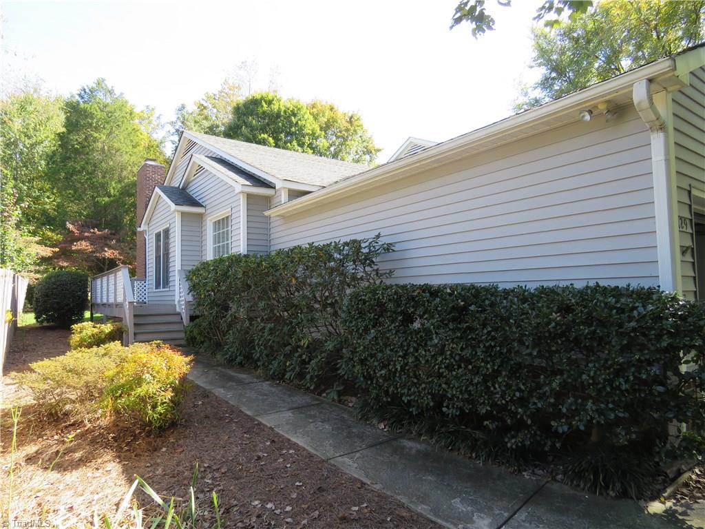129 Pebble Rdg Lane Winston-Salem, NC 27104 - Photo 1 of 24 Side entry with nice deck