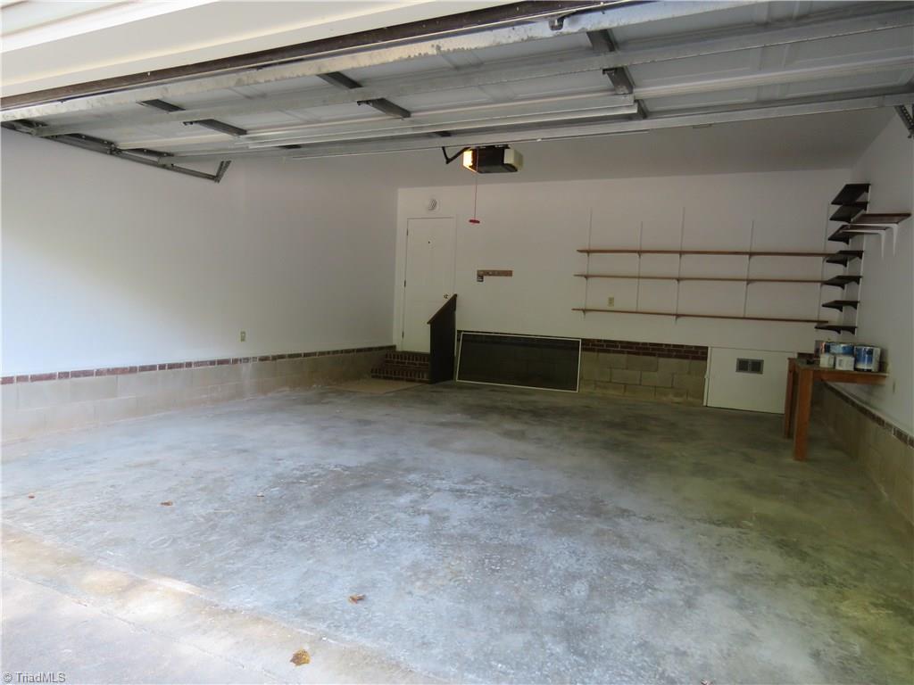 129 Pebble Rdg Lane Winston-Salem, NC 27104 - Photo 23 of 24 Two car garage offering parking space and storage space
