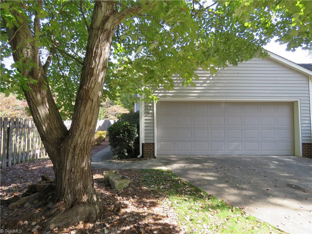 129 Pebble Rdg Lane Winston-Salem, NC 27104 - Photo 4 of 24 Two car garage with room for storage as well