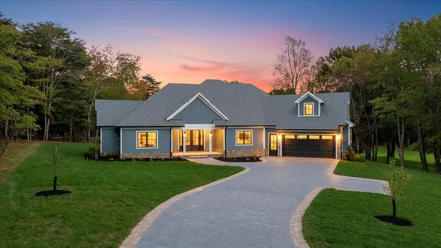 a view of room with window and wooden floor