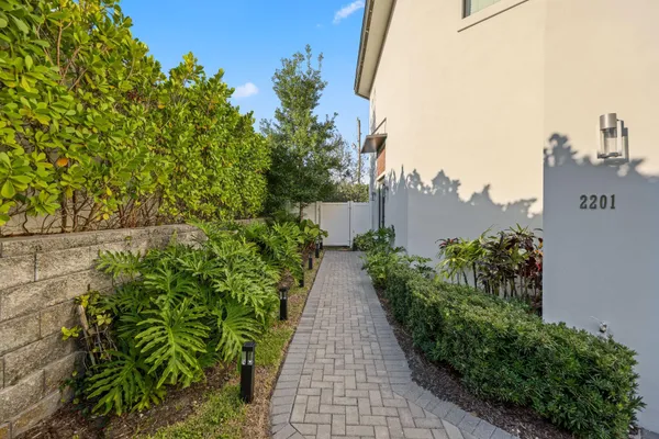 a backyard of a house with lots of green space
