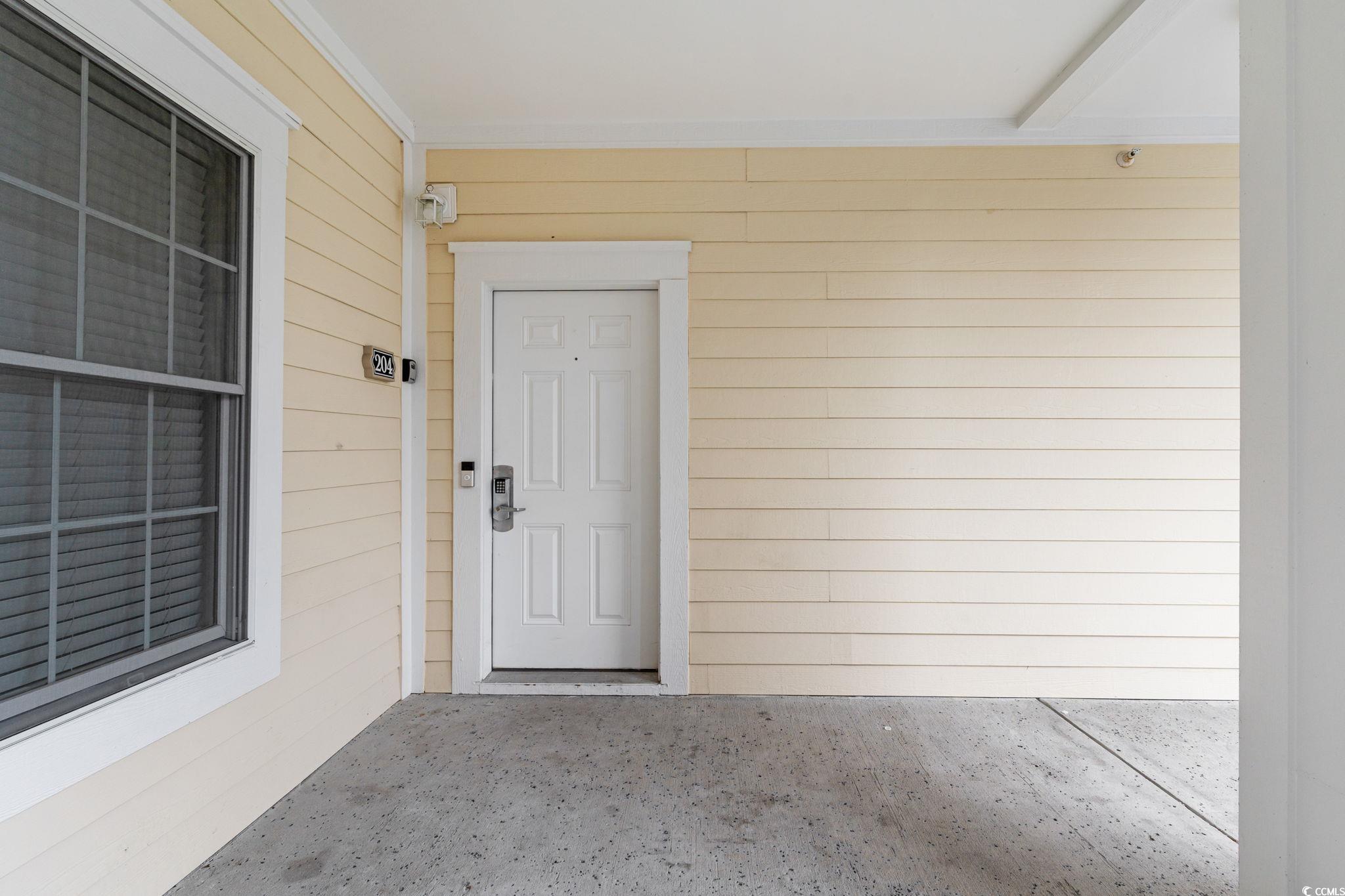 4843 Luster Leaf Circle, Unit 204 Myrtle Beach, SC 29577 - Photo 11 of 36 View of exterior entry
