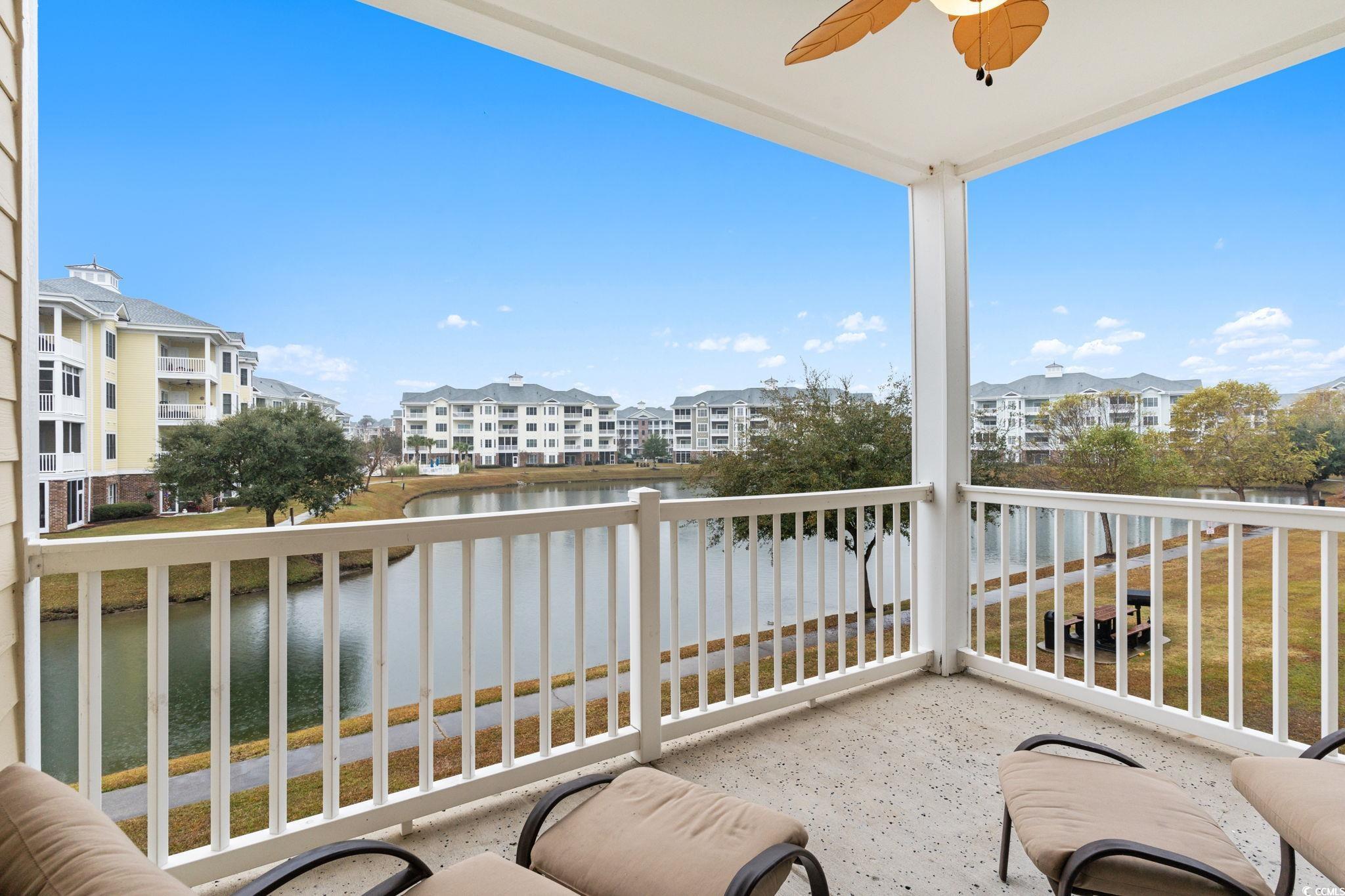 4843 Luster Leaf Circle, Unit 204 Myrtle Beach, SC 29577 - Photo 20 of 36 Balcony featuring a water view and ceiling fan