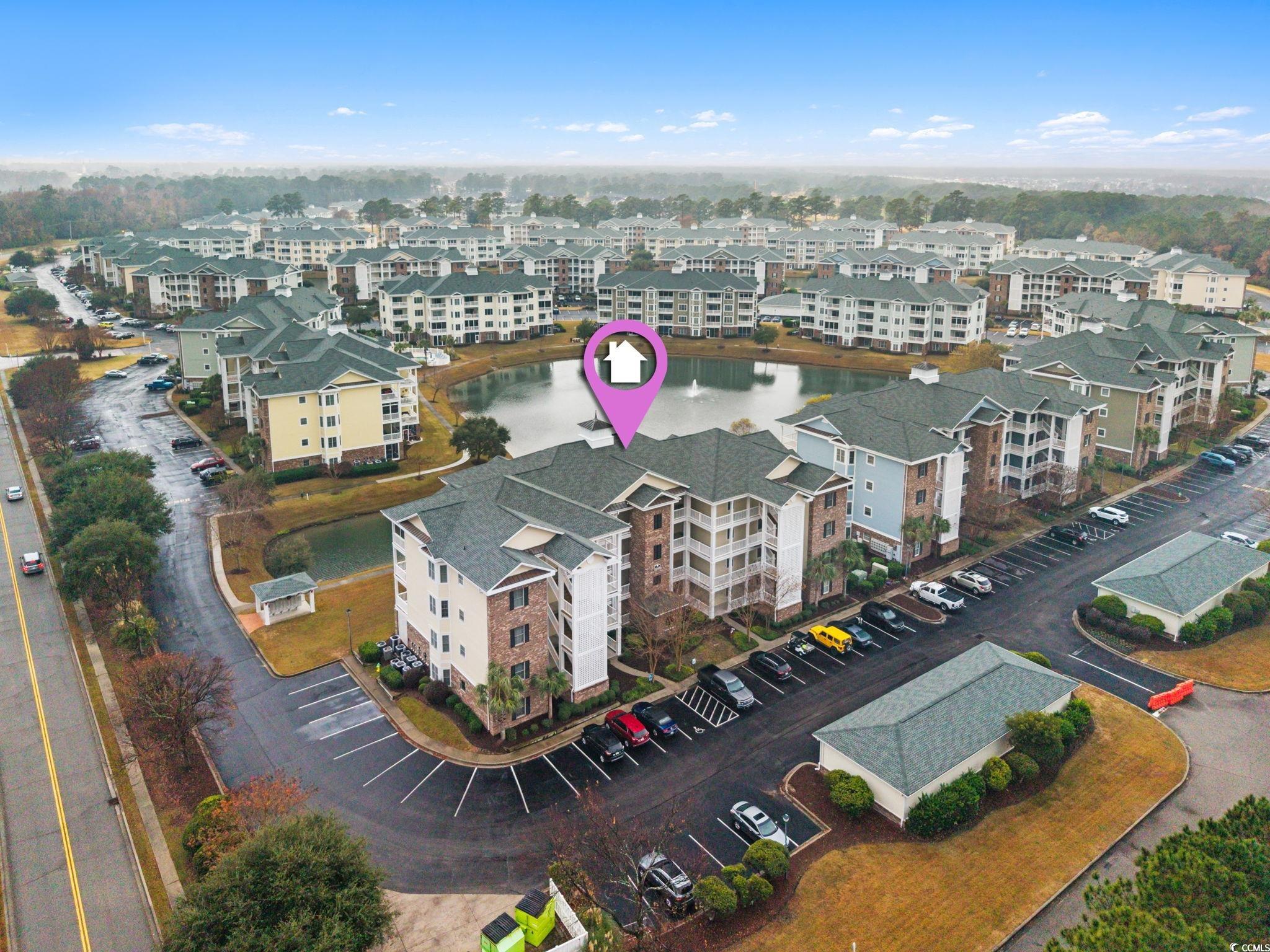 4843 Luster Leaf Circle, Unit 204 Myrtle Beach, SC 29577 - Photo 29 of 36 Aerial view of a large body of water and apartment complex / building