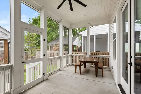a view of a house with backyard and a garden