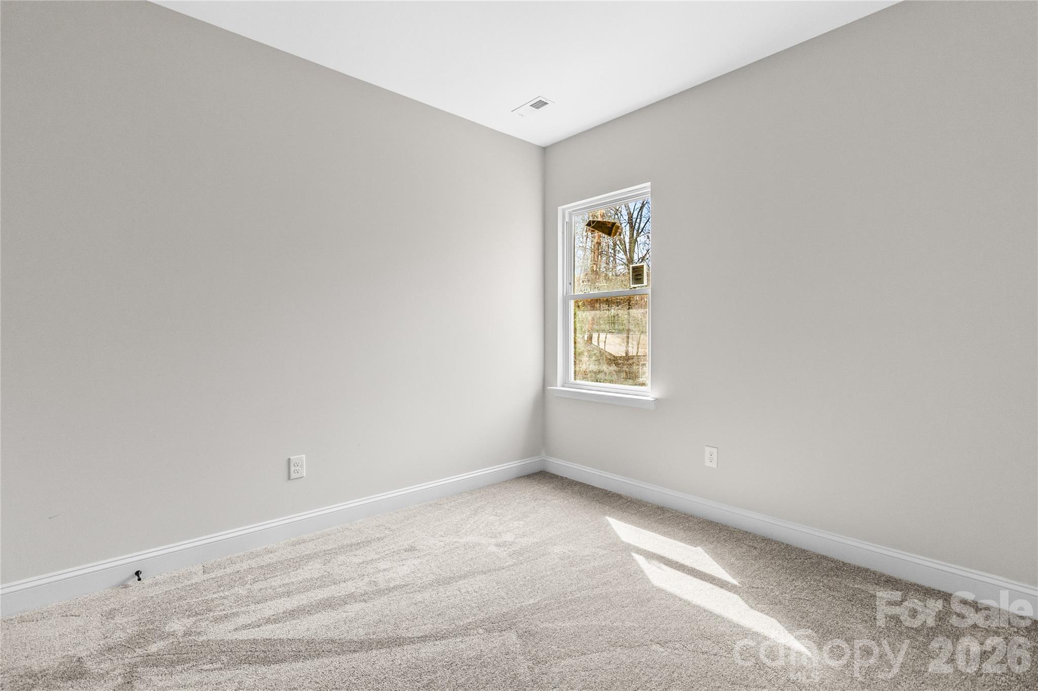 3692 Shannon Loop Denver, NC 28037 - Photo 30 of 47 a view of an empty room with a window