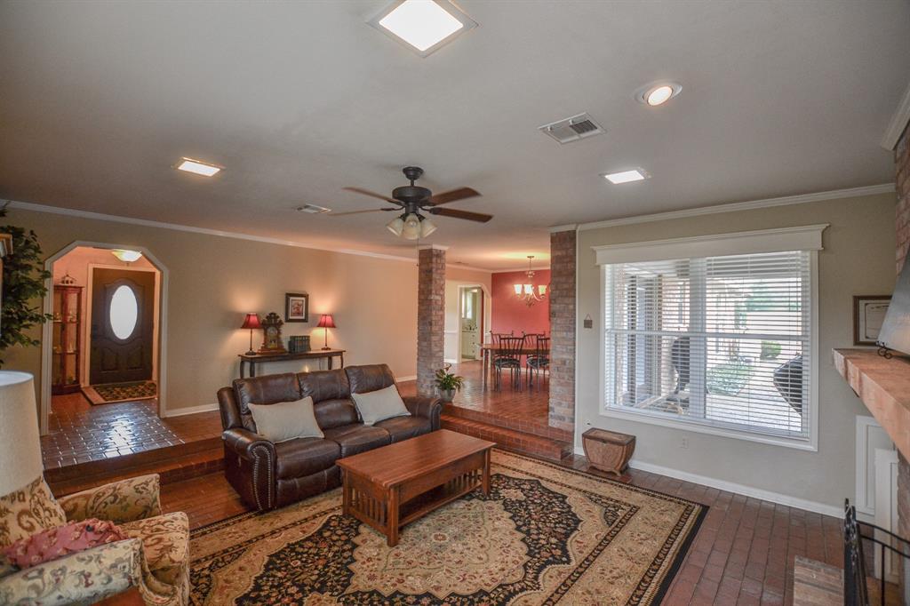 13612 County Road 3900 Athens, TX 75752 - Photo 12 of 40 a living room with furniture and wooden floor