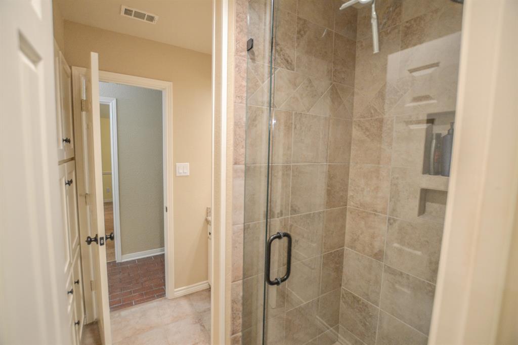 13612 County Road 3900 Athens, TX 75752 - Photo 25 of 40 a bathroom with a shower